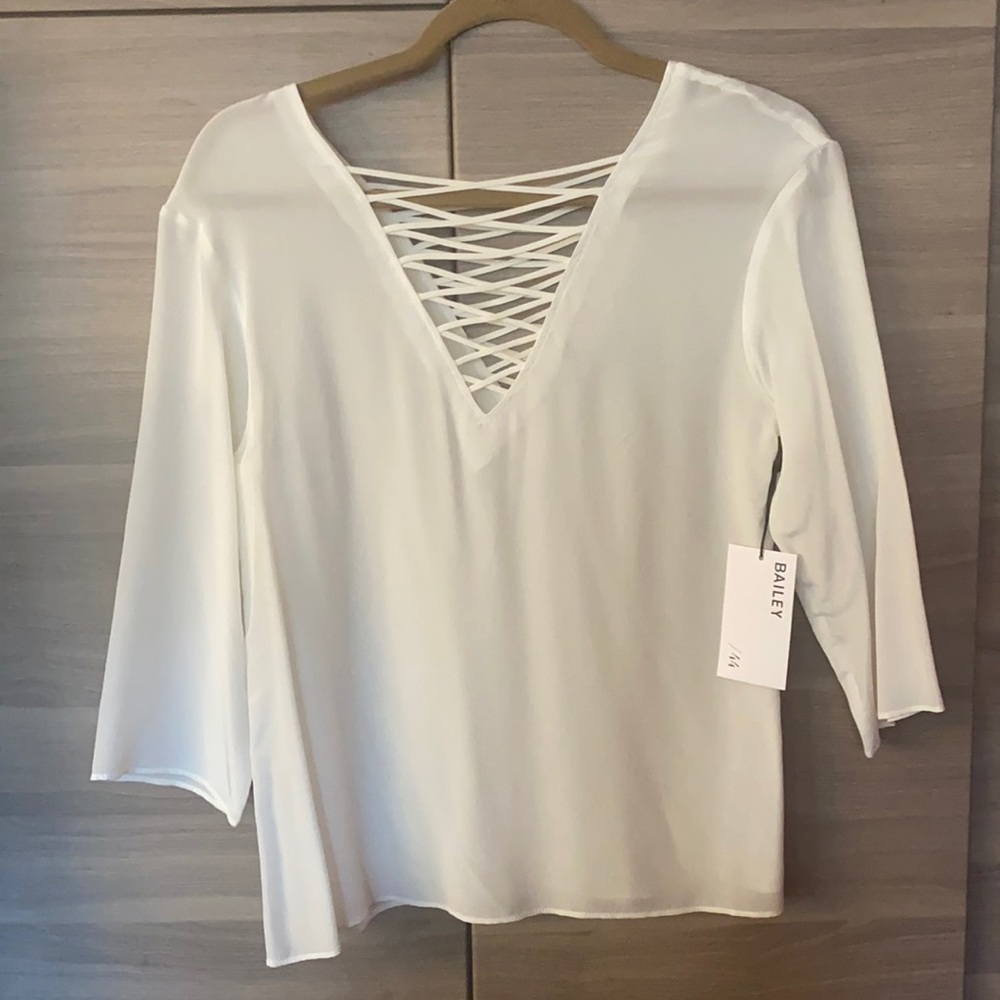 BNWT 100 percent silk cross cross blouse